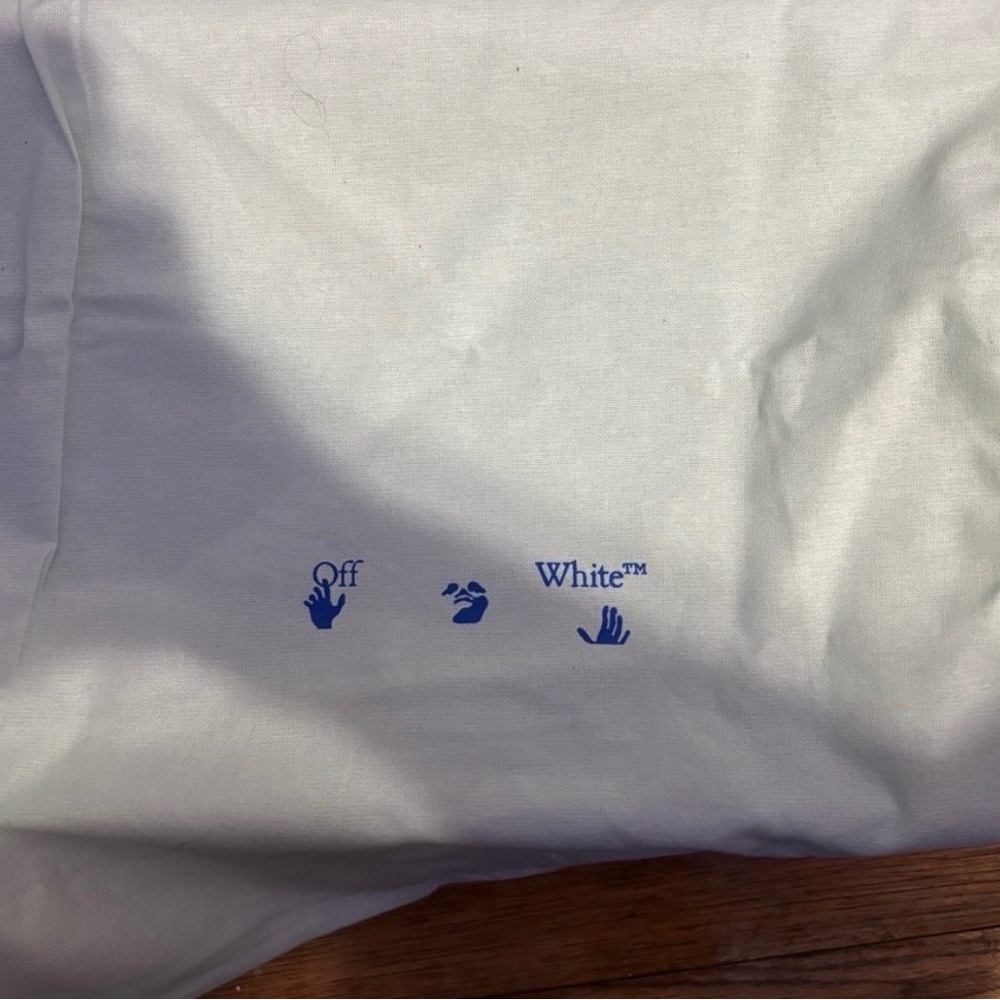 Off-White Tee with Blue Logo